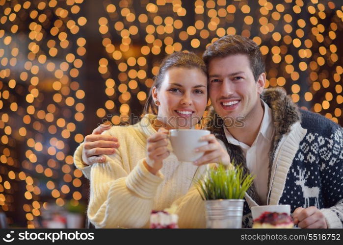 romantic evening date in restaurant happy young couple with wine glass tea and cake