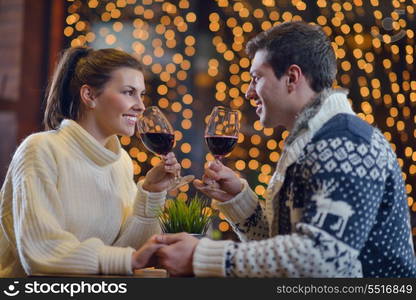 romantic evening date in restaurant happy young couple with wine glass tea and cake