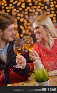 romantic evening date in restaurant happy young couple with wine glass tea and cake