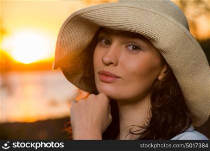 Romantic girl on the beach during sunset