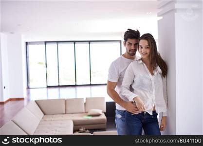 romantic happy young couple relax at modern bright home indoors