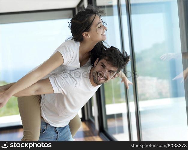 romantic happy young couple relax at modern home indoors and have fun
