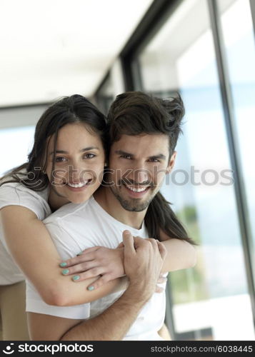 romantic happy young couple relax at modern home indoors and have fun