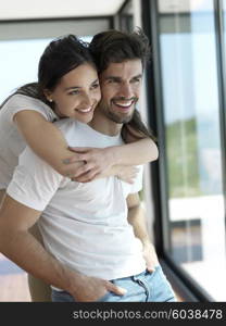 romantic happy young couple relax at modern home indoors and have fun