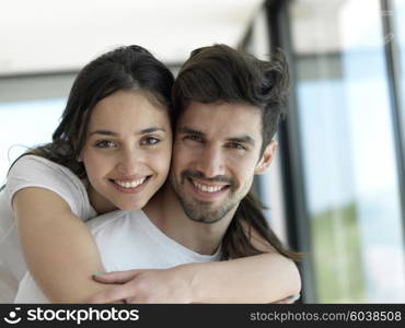 romantic happy young couple relax at modern home indoors and have fun