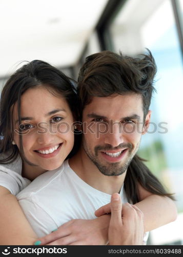 romantic happy young couple relax at modern home indoors and have fun