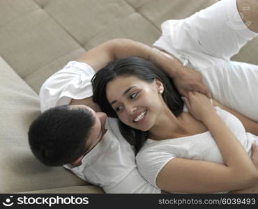 romantic happy young couple relax at modern home indoors and have fun