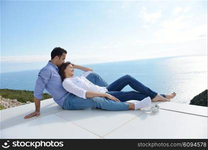 romantic happy young couple relax at modern home outdoors