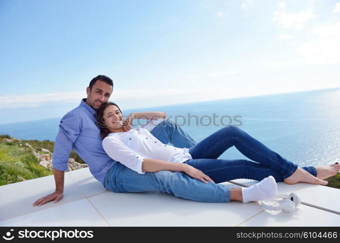 romantic happy young couple relax at modern home outdoors