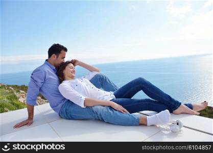 romantic happy young couple relax at modern home outdoors
