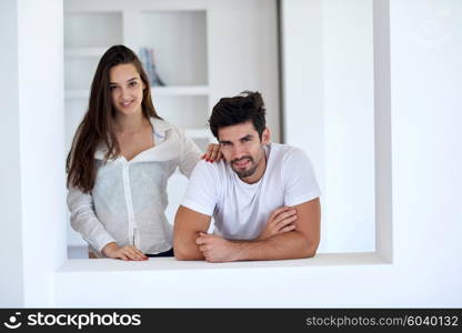 romantic happy young couple relax at modern home staircase indoors