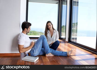 romantic happy young couple relax at modern home staircase indoors