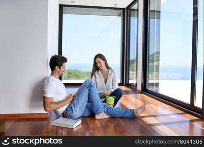 romantic happy young couple relax at modern home staircase indoors