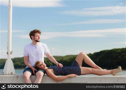 Romantic heterosexual couple in love relaxing peaceful outdoor enjoying sunlight good time