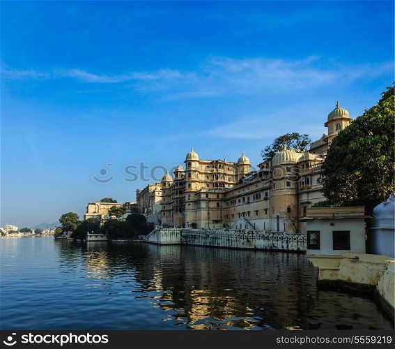 Romantic India luxury tourism concept background - Udaipur City Palace and Lake Pichola. Udaipur, Rajasthan, India