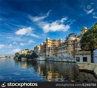 Romantic India luxury tourism concept background - Udaipur City Palace and Lake Pichola. Udaipur, Rajasthan, India