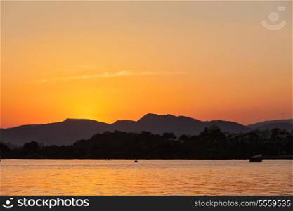 Romantic Lake Pichola on sunset. Udaipur, Rajasthan, India