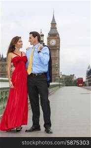 Romantic man and woman couple on Westminster Bridge with Big Ben in the background, London, England, Great Britain