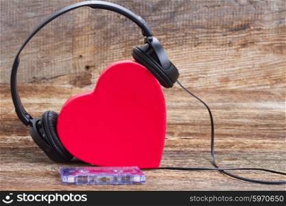 Romantic music concept . Romantic music concept - red heart with headphones