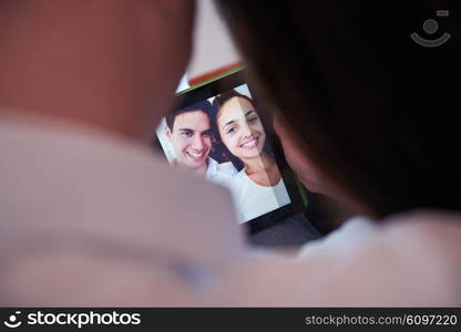 romantic relaxed young couple at modern home using tablet computer