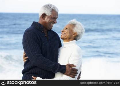 Romantic Senior Couple Hugging On Beach