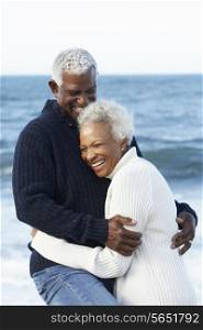 Romantic Senior Couple Hugging On Beach