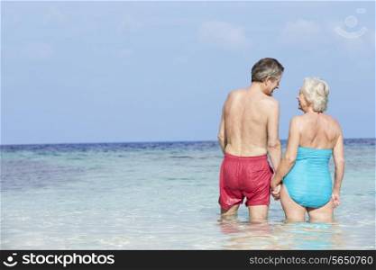 Romantic Senior Couple Standing In Beautiful Tropical Sea