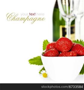 Romantic still life with champagne and fresh strawberry over white (with easy removable text)