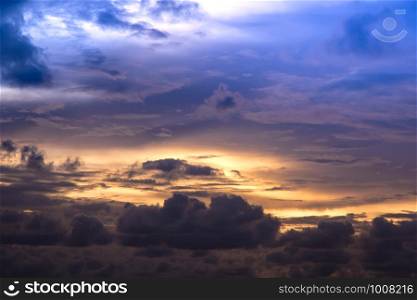 Romantic sunset sky with fluffy clouds and beautiful heavy weather landscape for use as background images and illustrations.