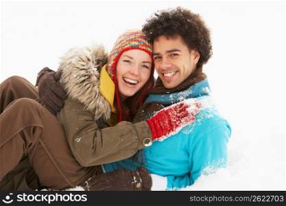 Romantic Teenage Couple Having Fun In Snow
