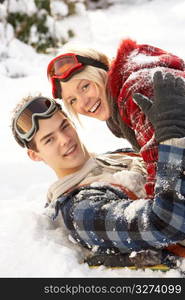 Romantic Teenage Couple Having Fun In Snow