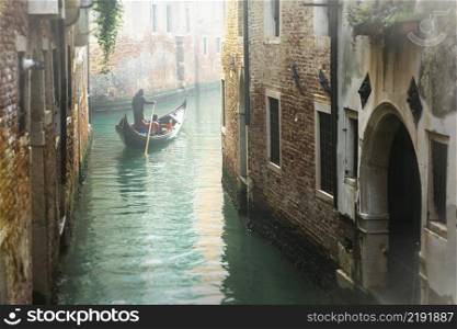 Romantic Venetian canals. Old narrow streets of Venice. Gondola trip. Italy