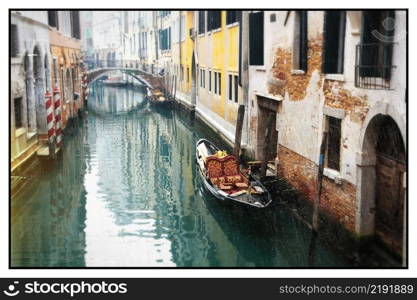 Romantic Venetian canals. Old narrow streets of Venice.  Retro styled sepia toned picture. Italy