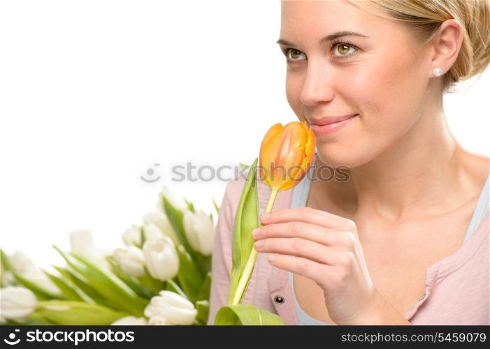 Romantic woman smell one orange tulip flower isolated on white