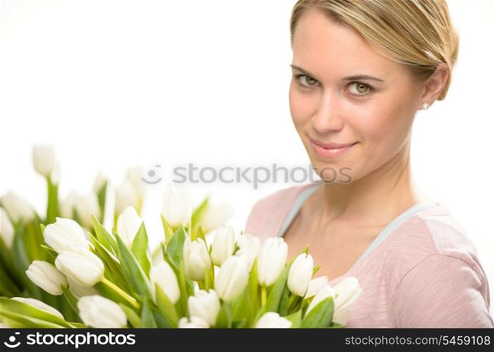 Romantic woman with bouquet of white tulip flowers
