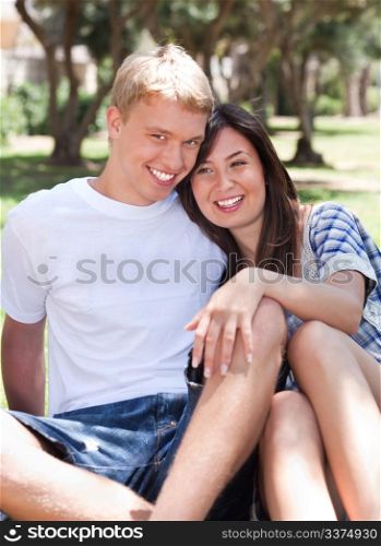 Romantic young couple enjoying day out and embracing each other in love