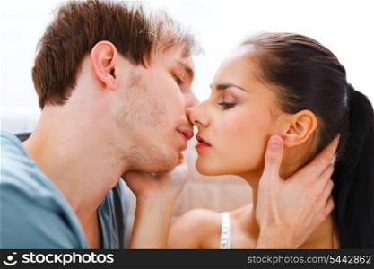 Romantic young couple having kiss&#xA;