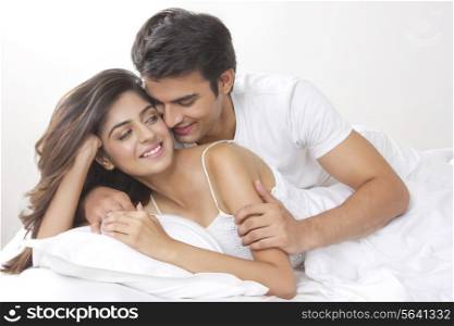 Romantic young couple in bedroom
