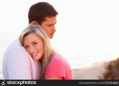 Romantic Young couple in love at sunset