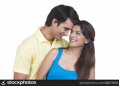 Romantic young couple isolated over white background