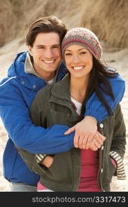 Romantic Young Couple On Winter Beach