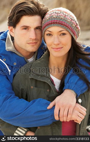 Romantic Young Couple On Winter Beach