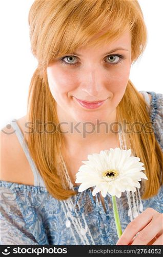 Romantic young woman hold flower gerbera daisy on white