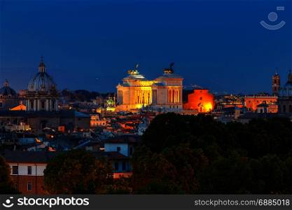 Rome. Aerial view of the city at night.. Aerial view of Rome from the hill Janiculum on the sunset. Italy.
