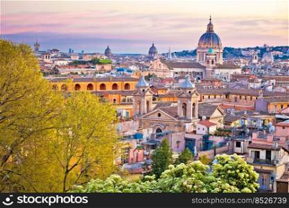 Rome. Colorful dusk view of Rome rooftops and landmarks, eternal city and capital of Italy