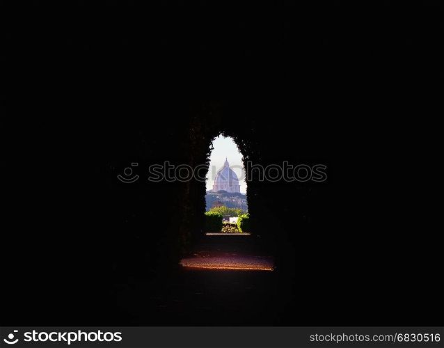 ROME, ITALY - APRIL 10, 2017: View of St. Peter's dome through the keyhole on the gate to the headquarters of the Knights of Malta on Rome's Aventine Hill in Rome, Italy on April 10, 2017.