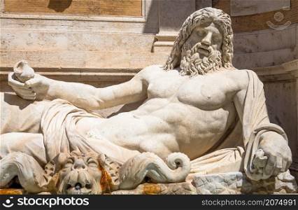 ROME, ITALY - CIRCA AUGUST 2020: famous Greek sculpture of Ocean god, named Marforio. Classic mythology in art.