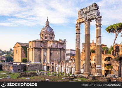 ROME, ITALY - CIRCA AUGUST 2020  sunrise light with blue sky on Roman ancient architecture.