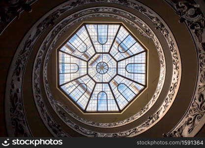 ROME, ITALY - CIRCA SEPTEMBER 2020: the famous spiral staircase with double helix made by Giuseppe Momo in 1932. Vatican Museum.