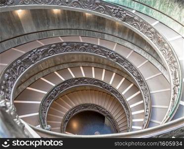 ROME, ITALY - CIRCA SEPTEMBER 2020  the famous spiral staircase with double helix. Vatican Museum, made by Giuseppe Momo in 1932
